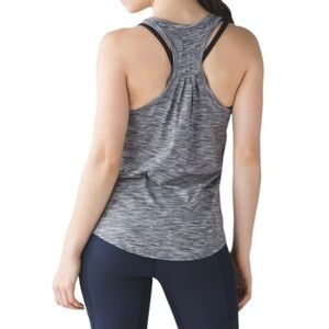 Lululemon Yogi Everyday Tank
4 Color Space Dye White Black size 10